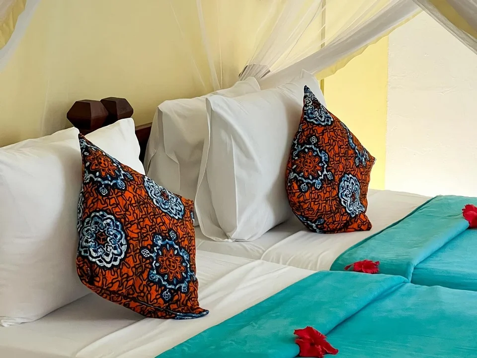 Chambre confortable de Flame Tree Cottages à Zanzibar